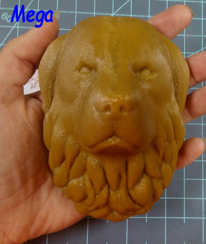 May include: A brown 3D printed dog head sculpture with a detailed face and a fluffy beard.