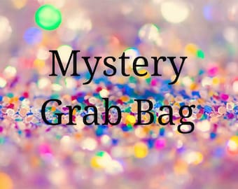 May include: A colorful, sparkly background with the text "Mystery Grab Bag" in black.