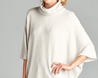 cape jumper with sleeves