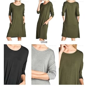 Puede incluir: Tres vestidos casuales de manga larga en color oliva, negro y gris. Los vestidos tienen un escote redondo y dos bolsillos a los lados.