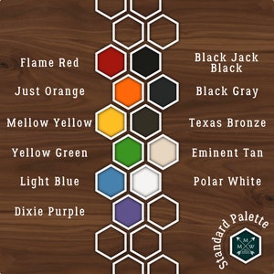 Puede incluir: Una tabla de paleta de colores con 10 muestras de colores dispuestas en un patr&oacute;n de panal. Los colores son: Rojo Llama, Naranja Justo, Amarillo Suave, Verde Amarillo, Azul Claro, P&uacute;rpura Dixie, Negro Jack Negro, Gris Negro, Bronce Texas, Bronceado Eminente y Blanco Polar. La tabla est&aacute; etiquetada como "Paleta Est&aacute;ndar".
