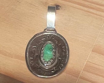 Sterling silver handmade pendant featuring Emerald Valley turquoise