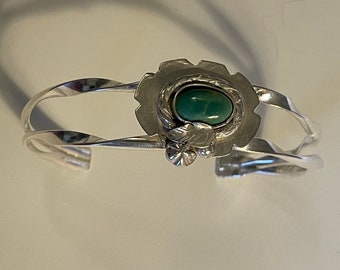 Sterling silver bracelet featuring Tyrone turquoise