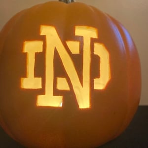 One 9” Notre Dame with just ND carved out on a Foam Pumpkin, pick orange or soft white color