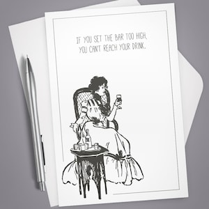 May include: A black and white illustration of a woman sitting in a chair with a glass of wine in her hand. The text "If you set the bar too high, you can't reach your drink." is printed above the illustration.