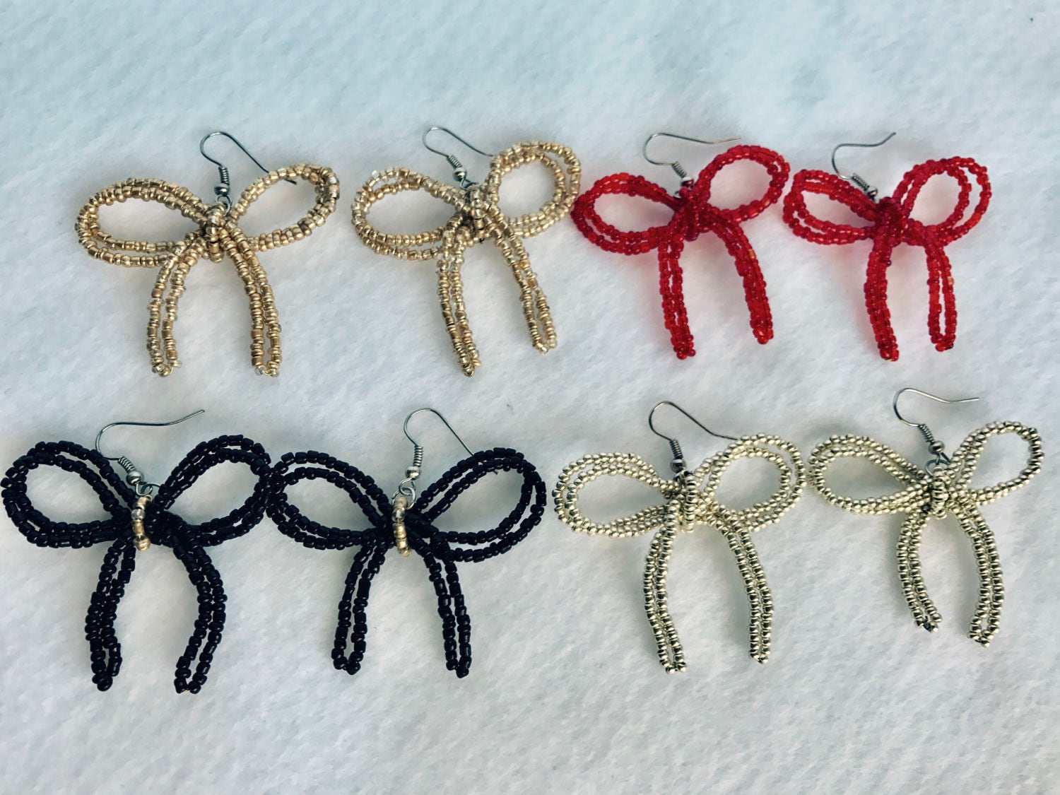 Beaded bow earrings best sale