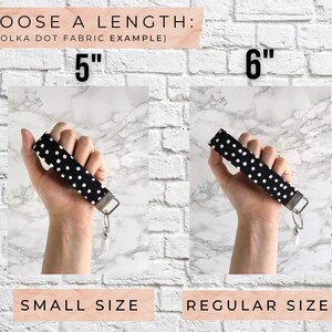 May include: Black and white polka dot key fobs in two sizes: 5 inches and 6 inches. The image shows a small size and a regular size. The text reads "CHOOSE A LENGTH" and "SMALL SIZE" and "REGULAR SIZE".