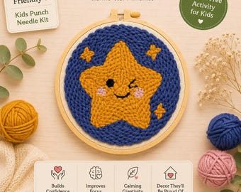 May include: A punch needle kit featuring a wooden embroidery hoop with a finished design of a yellow winking star on a dark blue background. The kit includes balls of yellow, blue, and pink yarn, with text labels reading Beginner Friendly.