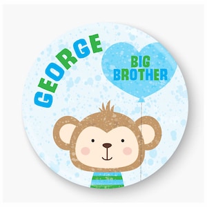 May include: A blue and green personalised plate with a monkey holding a blue heart balloon that says "Big Brother". The monkey is wearing a green and blue striped shirt. The plate says "George" in blue and green letters.