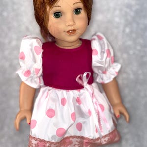 18 inch doll clothes. Burgundy, white & pink short party dress w/puffed sleeves. It will fit the AG, My Generation, or any 18&quot; doll