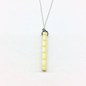 Guitar Nut Pendant Necklace