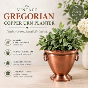 May include: A metallic copper urn planter with a scalloped rim and two side ring handles, containing a green leafy plant. The image includes text: VINTAGE GREGORIAN COPPER URN PLANTER, Timeless Charm. Beautifully Crafted. QUALITY CRAFTSMANSHIP, SOLID COPPER BEAUTY.