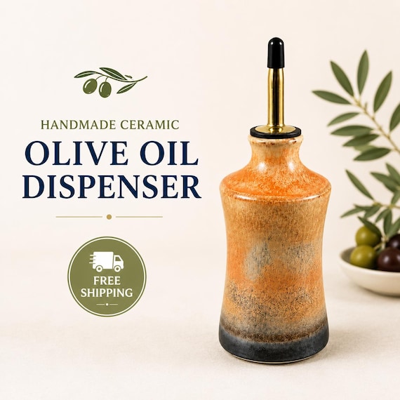 A wheel-thrown or hand-built ceramic oil cruet that turns an everyday countertop staple into a piece of functional pottery art.
