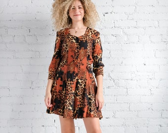 Vintage 1990s brown animal print button up playsuit romper