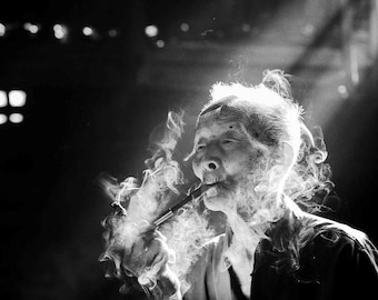 Photography of Chinese old man smoking a traditional pipe - black and white fine art print