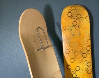 Skateboard hanger. Vertical.