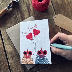 Biglietto d'auguri con uccellini d'amore