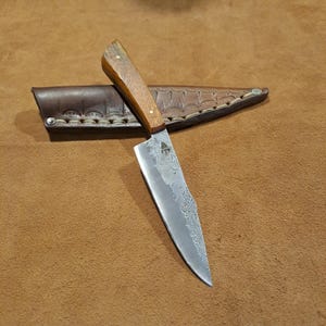 Hand forged bushcraft companion with handmade sheath