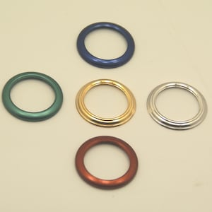 Vintage, New, Swiss Made 5- Piece Metal Bezel Set. Red, Sapphire Blue, Green, Gold and Silver. Comes in a Gift Pouch