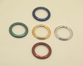 Vintage, New, Swiss Made 5- Piece Metal Bezel Set. Red, Sapphire Blue, Green, Gold and Silver. Comes in a Gift Pouch