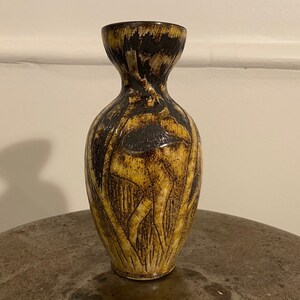 Vase with motif of man and giraffe in the forest / jungle from the Swedish pottery Torngrens