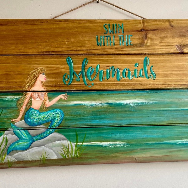 Swim with the Mermaids Wall Hanging Sign, acrylic painted mermaid sitting on rocks by the beach, ready for the beach house or a great gift!