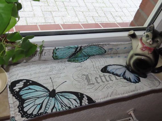 Window sill seat cushion clearance