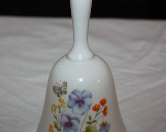 Vintage Porcelain Bell with Floral Design and Gold Tip