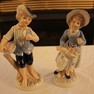 Vintage Old-Fashioned Porcelain Boy and Girl