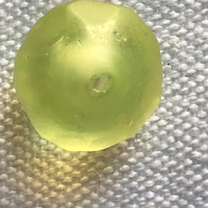 Uranium glass bead way cool bright fluorescent yellow UFO LIKE specimen