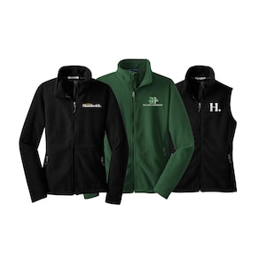May include: Three fleece jackets in black and green with different embroidered logos. The logos include "Humboldt", "Cal Poly Humboldt", and "H."