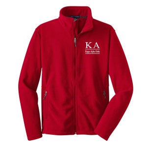 May include: Red fleece jacket with a zipper closure and two pockets. The jacket has a white embroidered logo that says "KA Kappa Alpha Order".