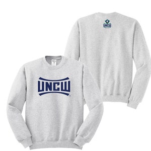 May include: A heather grey sweatshirt with a navy blue UNCW logo on the front and a smaller UNCW logo on the back.