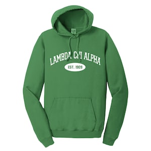 May include: Green hooded sweatshirt with white text that reads "Lambda Chi Alpha Est. 1909" in an arched design.