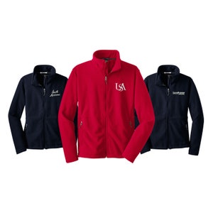 May include: Three fleece jackets, one red with white "USA" embroidery, one navy blue with white "South Alabama" embroidery, and one navy blue with white "South Alabama" embroidery.
