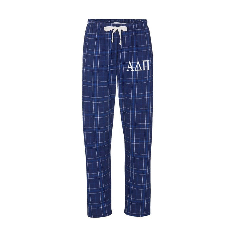 May include: Blue and white plaid pajama pants with a white "&Alpha;&Delta;&Pi;" logo.