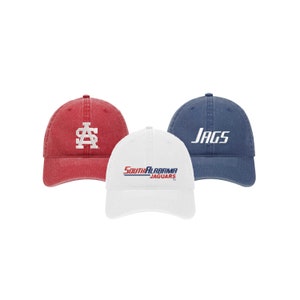 May include: Three different baseball caps. One is red with a white "AS" logo, one is white with a red and blue "South Alabama Jaguars" logo, and one is blue with a white "JAGS" logo.