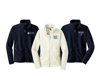May include: Three fleece jackets in different colors and designs. One is navy blue with the text "University of Maine" embroidered on the chest. Another is white with a blue "M" embroidered on the chest. The third is navy blue with a black and white bear head with the text "Maine" embroidered on the chest.