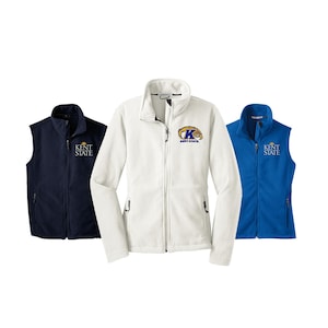 May include: Three fleece jackets in different colors: navy blue, white, and royal blue. The jackets have a zipper closure and two pockets. The white jacket has a Kent State logo embroidered on the chest. The navy blue and royal blue jackets have "Kent State" embroidered on the chest.
