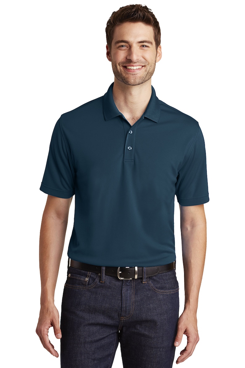 May include: A dark blue short-sleeved polo shirt with a button-up collar.