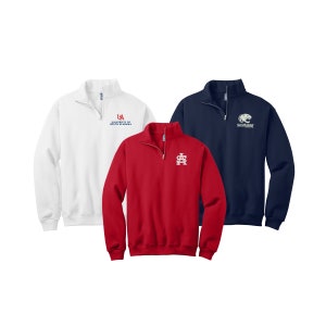 May include: Three quarter-zip sweatshirts in white, red, and navy blue. The white sweatshirt has the University of South Alabama logo embroidered on the left chest. The red sweatshirt has a white embroidered "AS" logo on the left chest. The navy blue sweatshirt has a white embroidered logo with a panther head and the words "Southeastern Conference" underneath.
