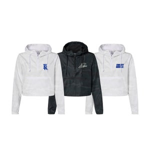 May include: Three white cropped windbreakers with different logos. The left windbreaker has a blue "ER" logo. The middle windbreaker has a black "Eagles" logo. The right windbreaker has a blue "EMORY RIDDLE" logo.