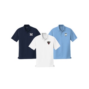 May include: Three polo shirts in different colors: navy blue, white, and light blue. The navy blue shirt has a white "M" embroidered on the chest. The white shirt has a black bear head with a red tongue embroidered on the chest. The light blue shirt has a white logo with a blue and white design embroidered on the chest.