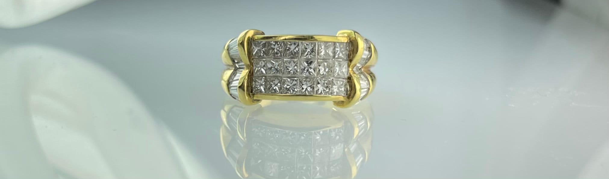 Product Image for 18K Yellow gold band ring with invisible set princess & baguette cut diamonds 2.50CTTW