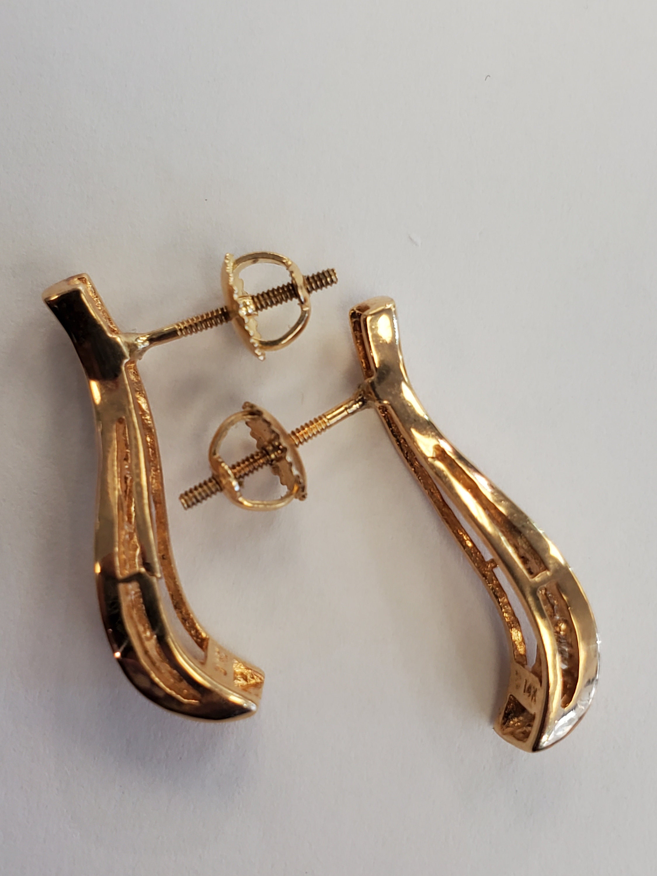 Product Image for Screwback Swirl Baguette Diamond Earrings 1/3cttw 14k Yellow Gold