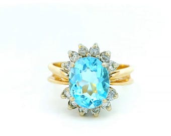 Oval Topaz and Diamond Ring