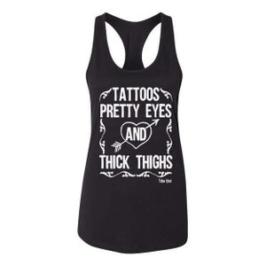 Tattoos, Pretty Eyes, and Thick Thighs