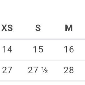 Puede incluir: Tabla de tallas que muestra las medidas de ancho y largo del cuerpo en pulgadas para las tallas XS a 2XL.
