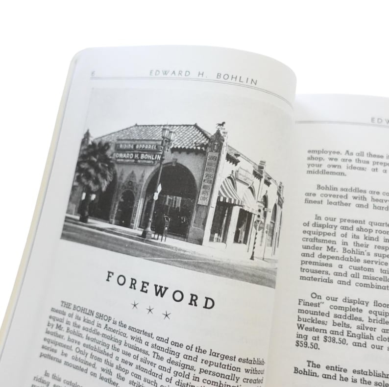 Puede incluir: Un libro abierto con una imagen en blanco y negro de un edificio con el texto "RIDING APPAREL EDWARD H. BOHLIN" sobre la entrada. La palabra "FOREWORD" est&aacute; impresa debajo de la imagen.