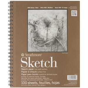 May include: A brown sketchbook with a spiral binding. The cover features the Strathmore logo and the text "Sketch". The text "Sketch paper fine tooth surface" is also on the cover, along with the text "100 sheets, feuilles, hojas". The cover also includes the text "400 Series | Best Série 400 | Meilleur Serie 400 El mejor".